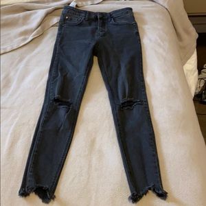 Faded black ripped jeans.